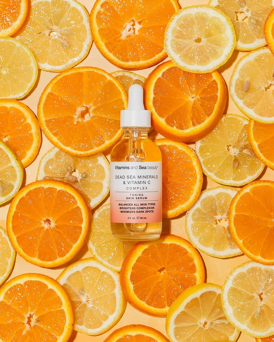 Vitamin Sea Beauty serum styled on fresh orange slices
